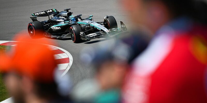 Russellovo vítězství, kolize mezi jezdci McLarenu