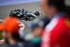Russellovo vítězství, kolize mezi jezdci McLarenu